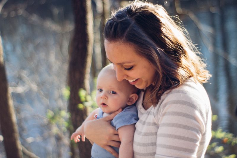 smiling-mom-and-infant.jpg